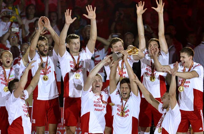 Polish players celebrate with the trophy during the awards ceremony following their win over Brazil in the FIVB Men's Volleyball World Championships final game in Katowice Poland on Sunday.