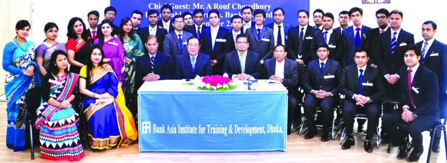 A Rouf Chowdhury, Chairman of Bank Asia Limited, poses with the trainees of 32nd foundation training course at its training institute on Tuesday.
