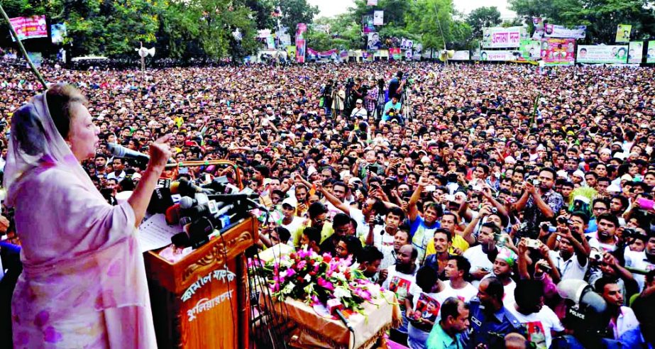 BNP Chairperson Begum Khaleda Zia addressing a huge public meeting at the playground of Niaz Mohammad High School in B'baria on Tuesday.