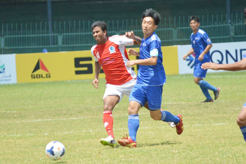 A moment of the football match of the AFC President's Cup between Sheikh Russel Krira Chakra and Rimyongsu Club of North Korea at Colombo on Wednesday.