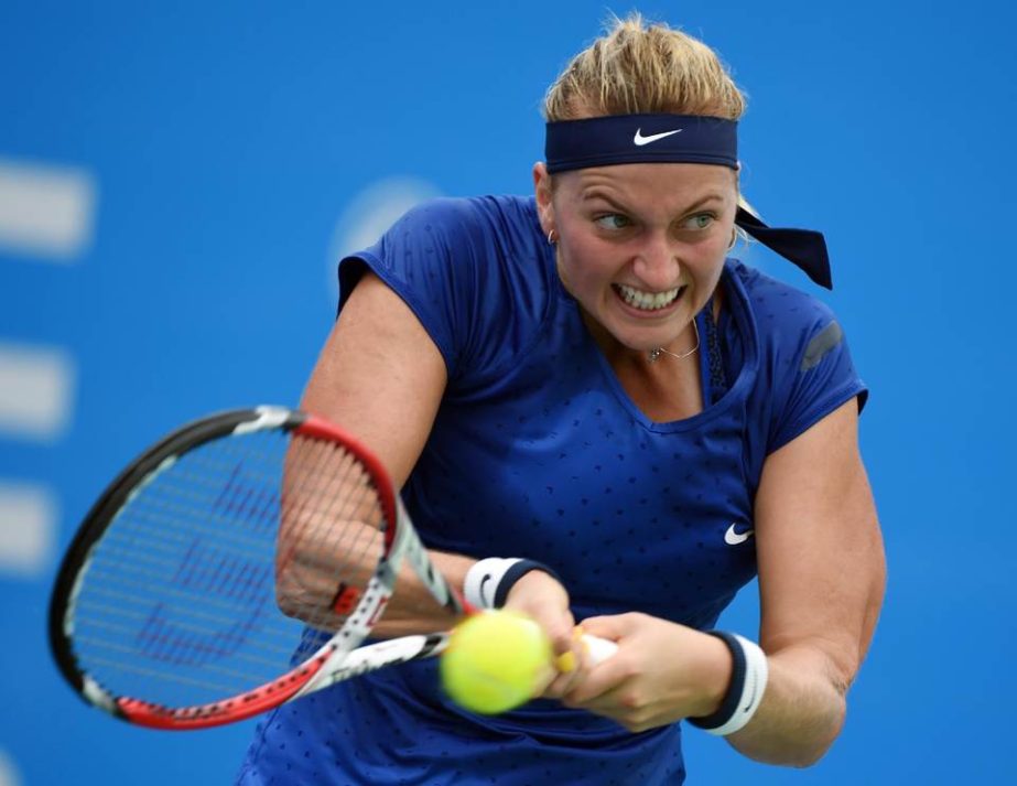 Petra Kvitova of the Czech Republic returns the ball to Caroline Garcia during their quarter-final match at the Wuhan Open in China on Thursday.