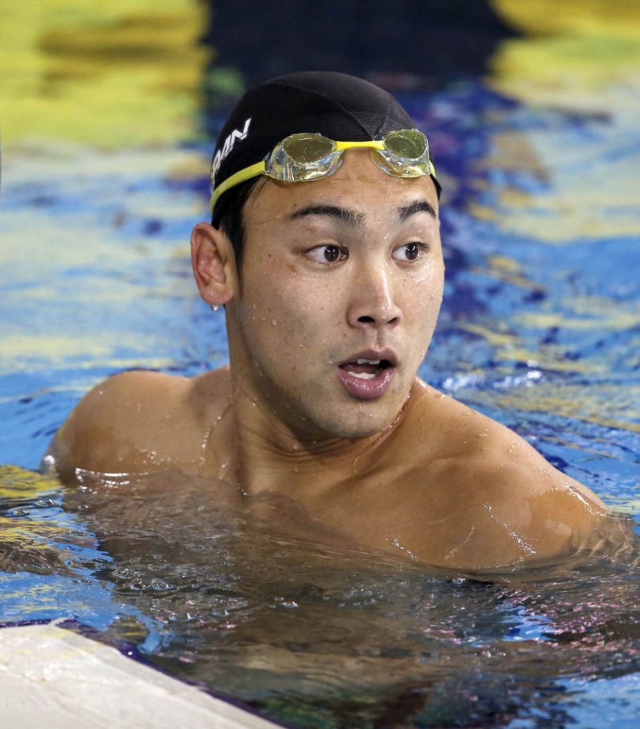 In Sept. 24, 2014 photo, Japan's Naoya Tomita reacts after his men's 100m breaststroke final at the 17th Asian Games in Incheon, South Korea. Tomita, the 200-meter breaststroke gold medalist from the previous Asian Games, could face criminal charges for