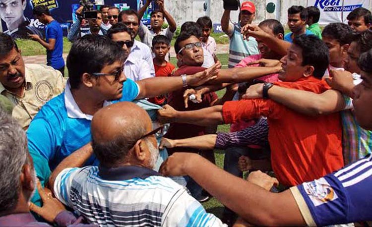 A clash during the final match of the Kool-BSJA Media Cup Football Tournament between Dhaka Tribune and My TV at the BFF Artificial Turf on Sunday.