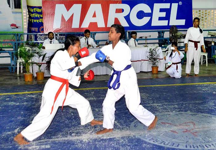 A scene from the karate event of the Marcel Refrigerator 2nd School & College Bashap Championship at the Gymnasium of National Sports Council on Sunday.