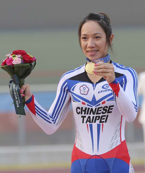 Taiwan's Hsiao Mei-yu displays her gold medal in the Women'sÂ Omnium track cycling race at the 17th Asian Games in Incheon, South Korea recently.