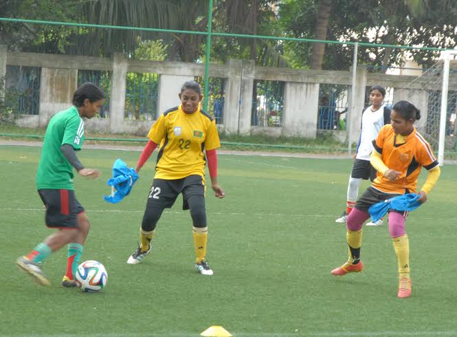 Players of Bangladesh Under-16 National Women's Football team during their practice session at the BFF Artificial Turf on Tuesday.