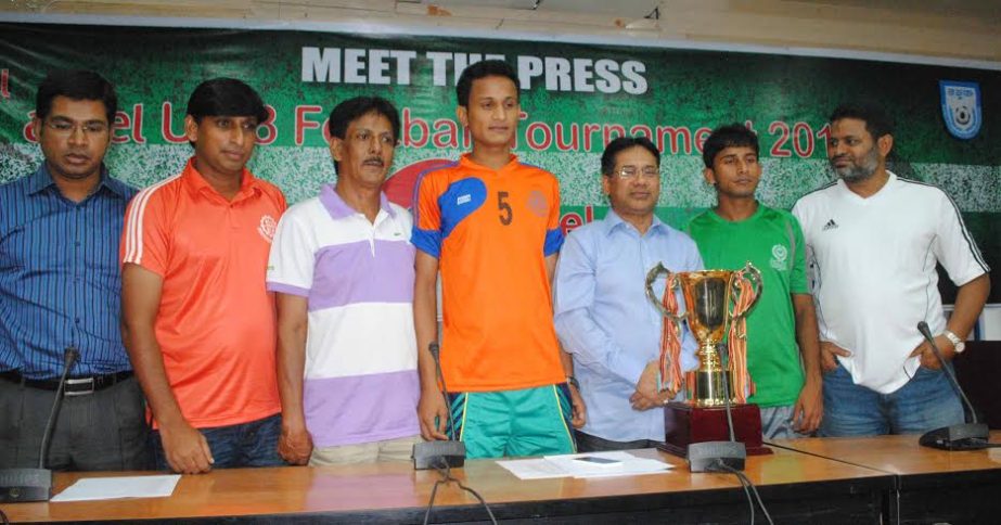 Officials and Captains of Mohammedan Sporting Club Limited and Brothers Union Club with Senior Vice-President of BFF Abdus Salam Murshedy pose for a photograph at the conference room of Bangladesh Football Federation House on Tuesday.