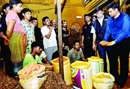 A mobile court of Rapid Action Battalion [RAB] confiscated a large quantity of adulterated spice conducting a drive ahead of Eid-ul Azha at three factories at Hasina Market in the city's Karwan Bazar on Tuesday. Led by a RAB magistrate Md Anwar Pasha, th