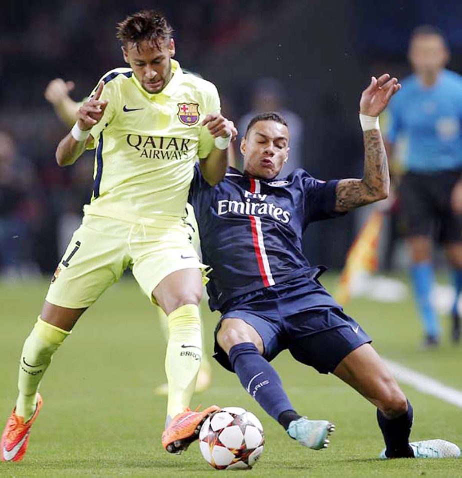 Barcelona's Neymar (left) is challenged by PSG's Gregory van der Wiel during the Champions League soccer match between PSG and Barcelona at the Parc des Princes stadium in Paris on Tuesday.