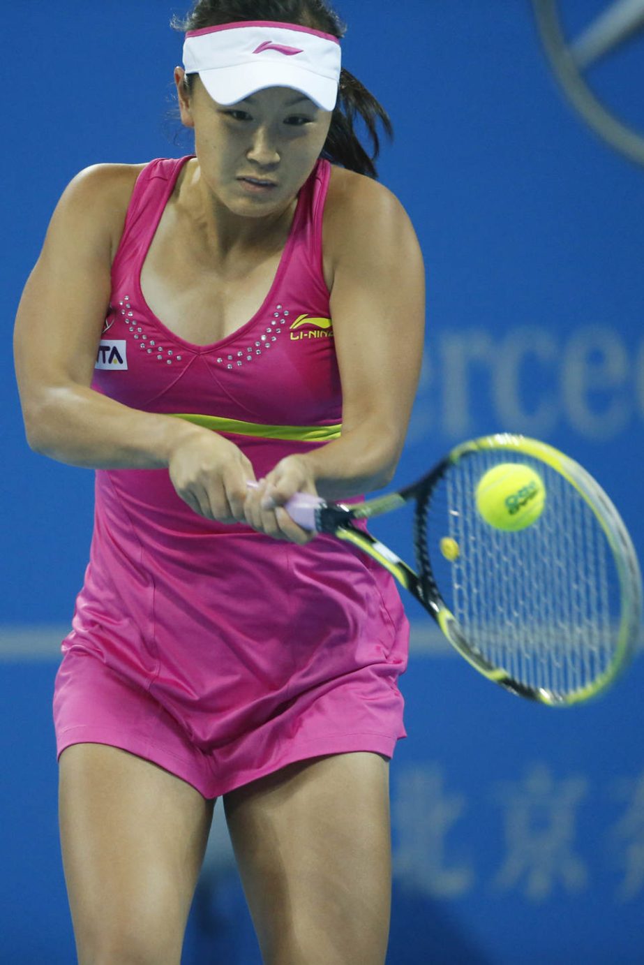 Peng Shuai of China returns a shot from Petra Kvitova of the Czech Republic during the China Open tennis tournament at the National Tennis Stadium in Beijing, China on Wednesday.