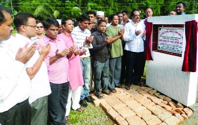 SYLHET: Mahmud-Us- Samad Chowdhury MP, Sylhet offering munajat after laying the founding stone of new building of Adorsho High School at Silam Union of South Surma Upazila recently.