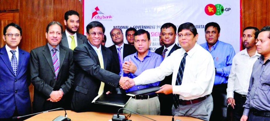 Sohail RK Hussain, Managing Director & CEO of City Bank and Md Faruque Hossain, Director General of Central Procurement Technical Unit (CPTU) of the Ministry of Planning sign a Memorandum of Understanding to provide e-payment services like registrationre