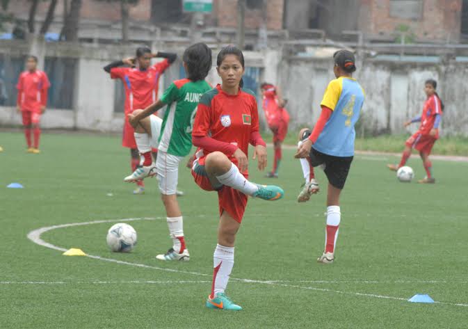 Members of Bangladesh National Women's Football team during their practice session at the BFF Artificial Turf on Saturday.