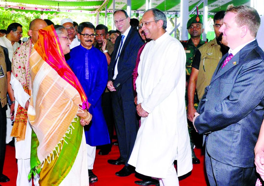 Prime Minister Sheikh Hasina exchanging pleasantries with diplomats at Ganobhaban in the city on Monday on the occasion of holy Eid-ul-Azha.