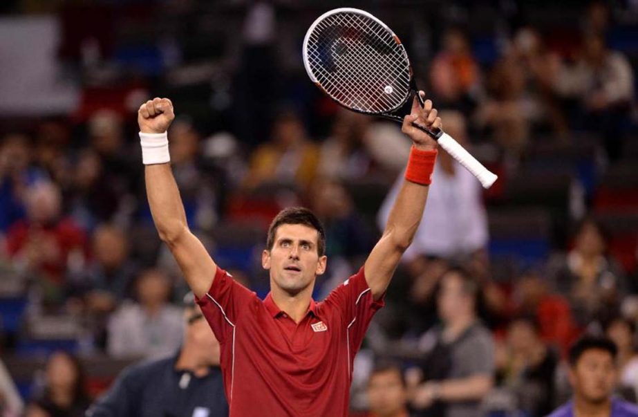 Serbia's Novak Djokovic reacts after winning against Dominic Thiem of Austria during their men's singles second round match at the Shanghai Masters tennis tournament in Shanghai on Wednesday.