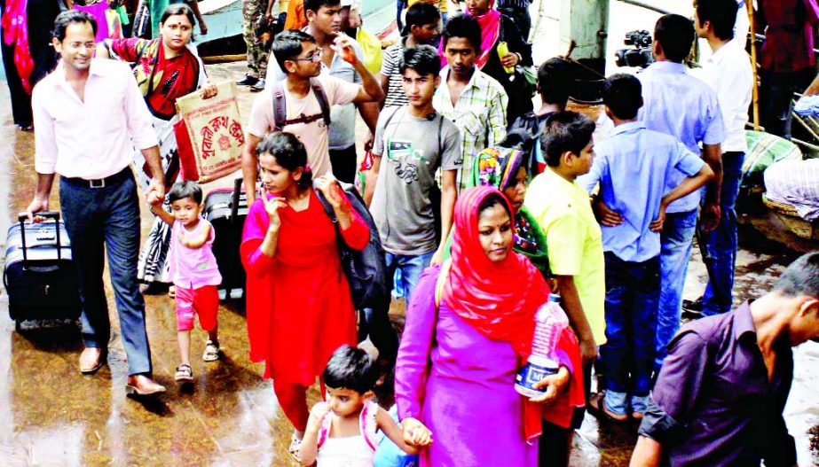 More home-goers returned to Dhaka on Thursday after celebrating Eid-ul Azha with their kith and kin. This photo was taken from Sadarghat launch terminal.