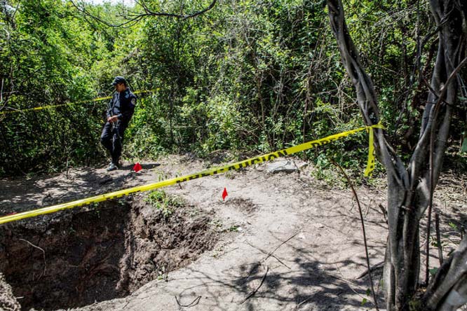 The badly burned bodies of 28 â€˜studentsâ€™ were found last weekend in a mass grave on a hillside in the outskirts of Iguala, Mexico