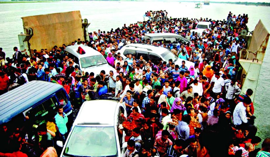 Thousands of people crowded the vehicles laden ferry at Kawrakandi avoiding the risk of launches journey to the capital after celebrating Eid-ul-Azha on Friday.