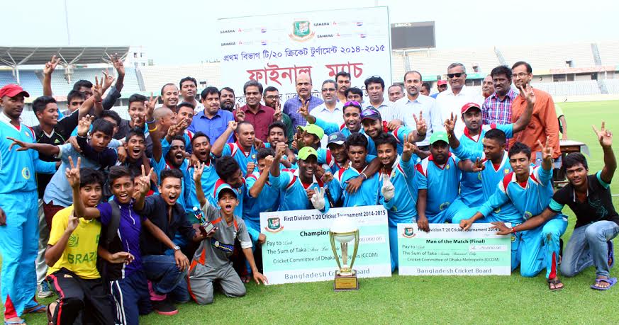 Members of Indira Road Krira Chakra, the champions of the Dhaka Metropolis First Division T20 Cricket with guests and officials of Bangladesh Cricket Board pose for a photo session at the Sher-e-Bangla National Cricket Stadium in Mirpur on Sunday.