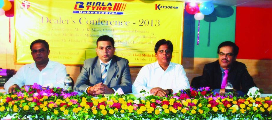 Motahar Hossain, sole distributor of Birla Tyres in Bangladesh, presiding over the Dealer's Conference-2013 of the company at a Cox's Bazar hotel on Saturday. Ashish Kumar Mishra and Chief of Institutional Business Bhobesh Mukherjee were present as chi