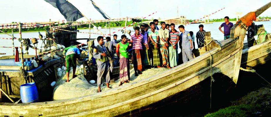 Department of Fisheries and Coastguard members jointly conducted special drive at the Kuakata area in Bay and seized two trawlers with nine fishermen on Monday for catching Hilsa despite existing 15-day ban.