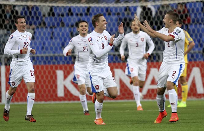 Czech Republic players celebrate their victory against Kazakhstan in their Euro 2016 group A qualifying round soccer match in Astana, Kazakhstan on Monday.