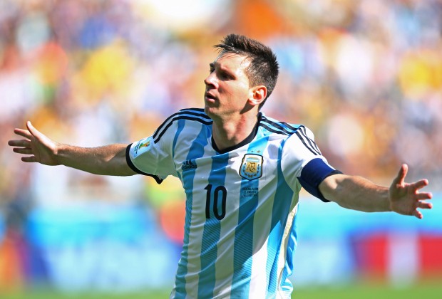 Lionel Messi celebrates after scoring goal against Hong Kong.