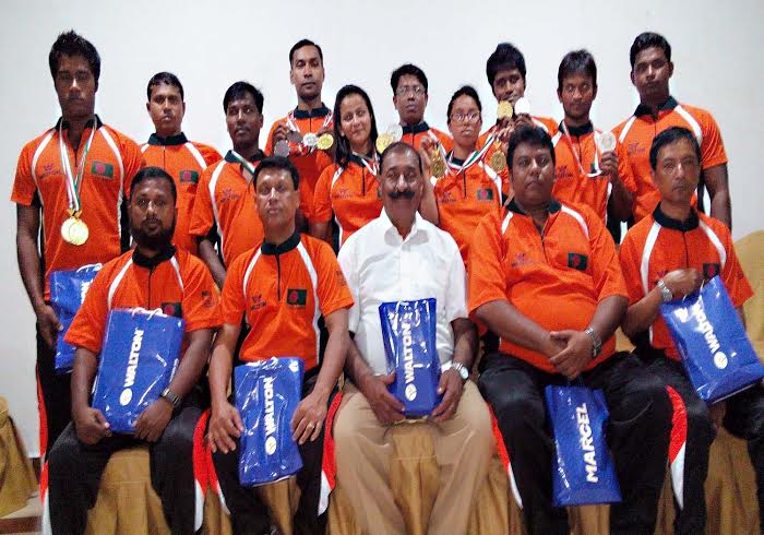 Bangladesh Karate team, the runners-up of the 5th International Karate Championship pose for a photo session at Goa in India on Tuesday.