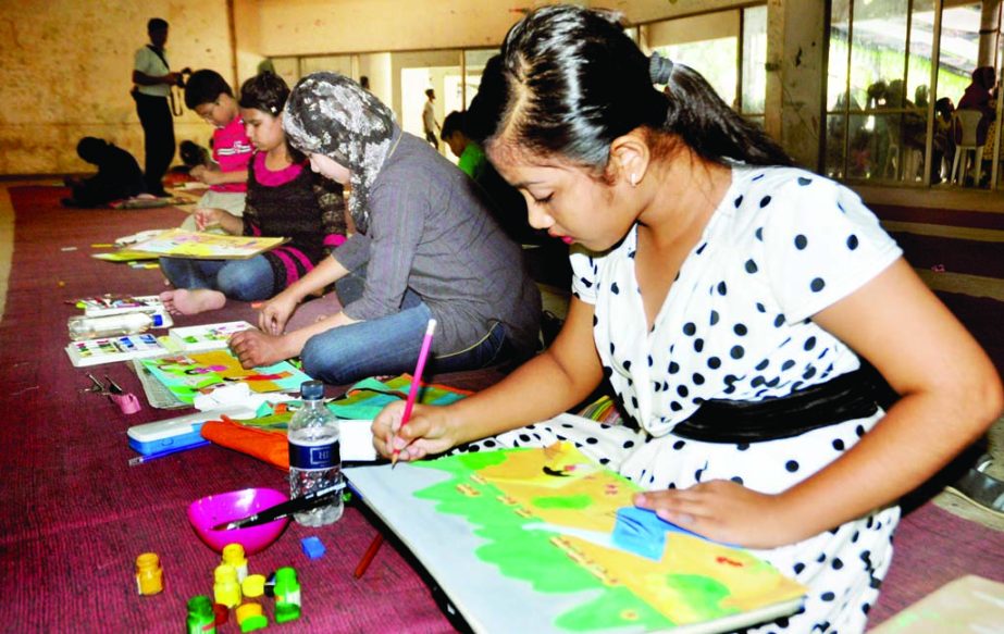 Children are engrossed in drawing at a painting competition organized in the auditorium of the National Press Club on Thursday marking 6oth founding anniversary of the club.