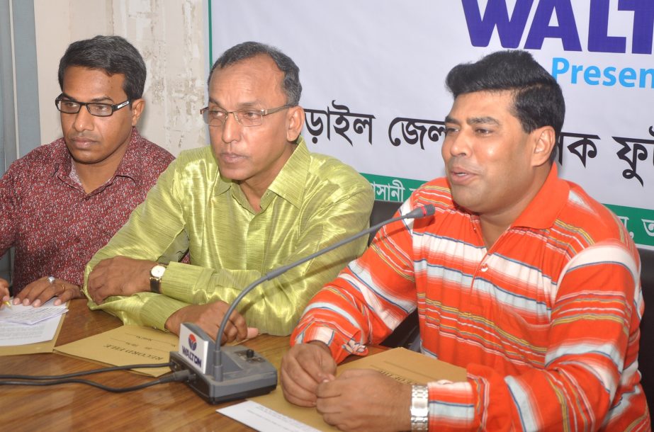 Additional Director of Walton FM Iqbal Bin Anwar Dawn addressing a press conference at the conference room of Moulana Bhashani National Hockey Stadium on Thursday.