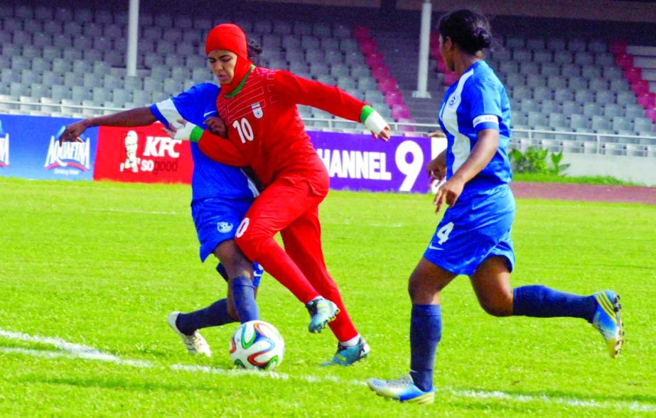 A scene from the football match of the AFC Under-16 Women's Championship Qualifiers between Iran Under-16 National Women's Football team and India Under-16 National Women's Football team at the Bangabandhu National Stadium on Friday.