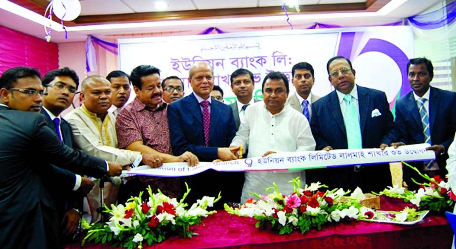 Planning Minister AHM Mustafa Kamal inaugurating a new branch of Union Bank Limited at Lalmai in Comilla on Saturday. Managing Director Md Abdul Hamid Miah and Lalmai branch manager AM Salimullah were present.