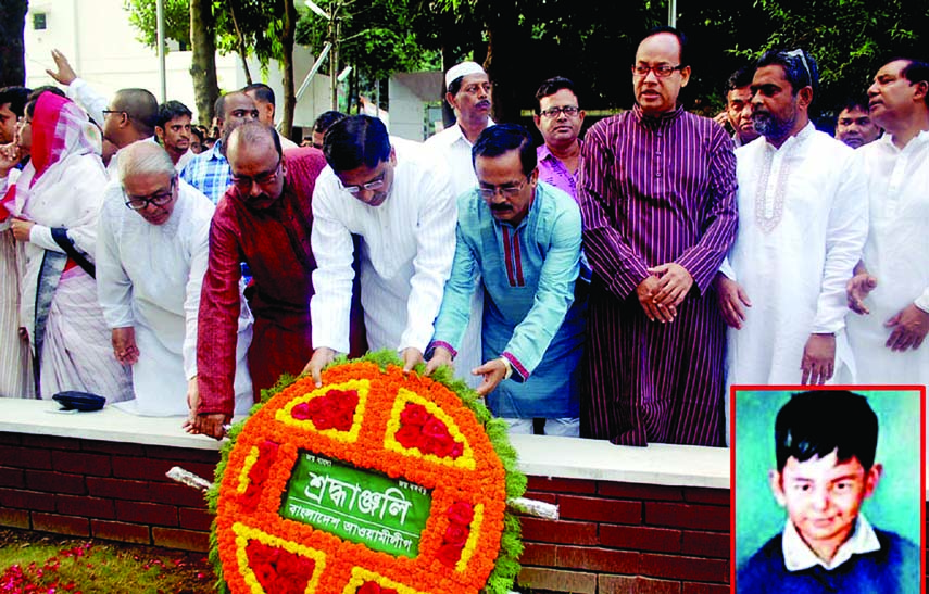 Leaders of Bangladesh Awami League and its associate bodies placing floral wreaths at the grave of Sheikh Russel (inset), youngest son of Bagabandhu Sheikh Mujibur Rahman at Banani Graveyard in the city on Saturday marking the 50th birth anniversary of Ru