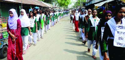 NATORE: Students, teachers and locals of Klaiganj Upazila brought out a procession protesting grabbing of play ground of Kaliganj Bornomala Institute on Saturday.