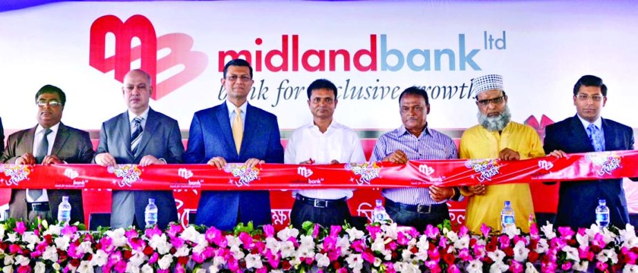Md Belal Hossain, Director of Midland Bank Limited, inaugurating new branch of the bank at Zirabo Bazar of Ashulia recently. Md Ahsan-uz-Zaman, Managing Director and Khandaker Nayeemul Kabir, Deputy Managing Director of the bank were present.