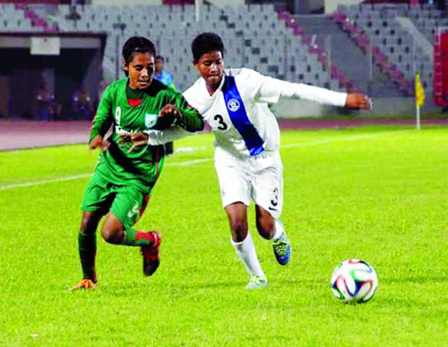 A scene from the football match of the AFC Under-16 Women's Championship Qualifiers between Bangladesh Under-16 National Women's Football team and India Under-16 National Women's Football team at the Bangabandhu National Stadium on Sunday.