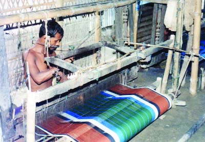 NARSINGDI: A worker busy in a handloom industry in Narsingdi.