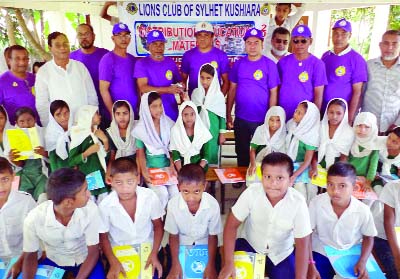 SYLHET: Loins Club of Sylhet distributing educational materials among the students of Ali Nagar Parimary School of South Surma Upazila to mark the Service Month October recently.