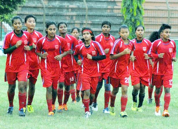 Members of Bangladesh Under-16 National Women's Football team take part at the practice session at the Bir Shreshtha Shaheed Sepoy Mohammad Mostafa Kamal Stadium in Kamalapur on Wednesday.