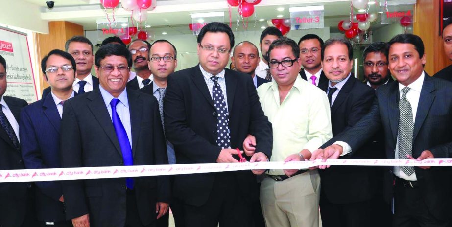 Rubel Aziz, Chairman of City Bank inaugurating bank's new branch at Halisahar in Chittagong on Wednesday. Sohail RK Hussain, MD; Mashrur Arefin and Badrudduza Choudhury, DMDs were present.