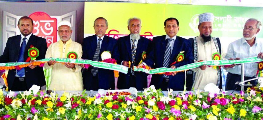 Abdus Salam, FCA, FCS, Director of Islami Bank Bangladesh Limited, inaugurating 288th branch at Hajirhat, Kamalnagar, Laxmipur on Thursday. Advocate Syed Mohammad Shamasul Alam, Chairman, Kamalnagar Upazila and Mohammad Abul Bashar, Deputy Managing Direct