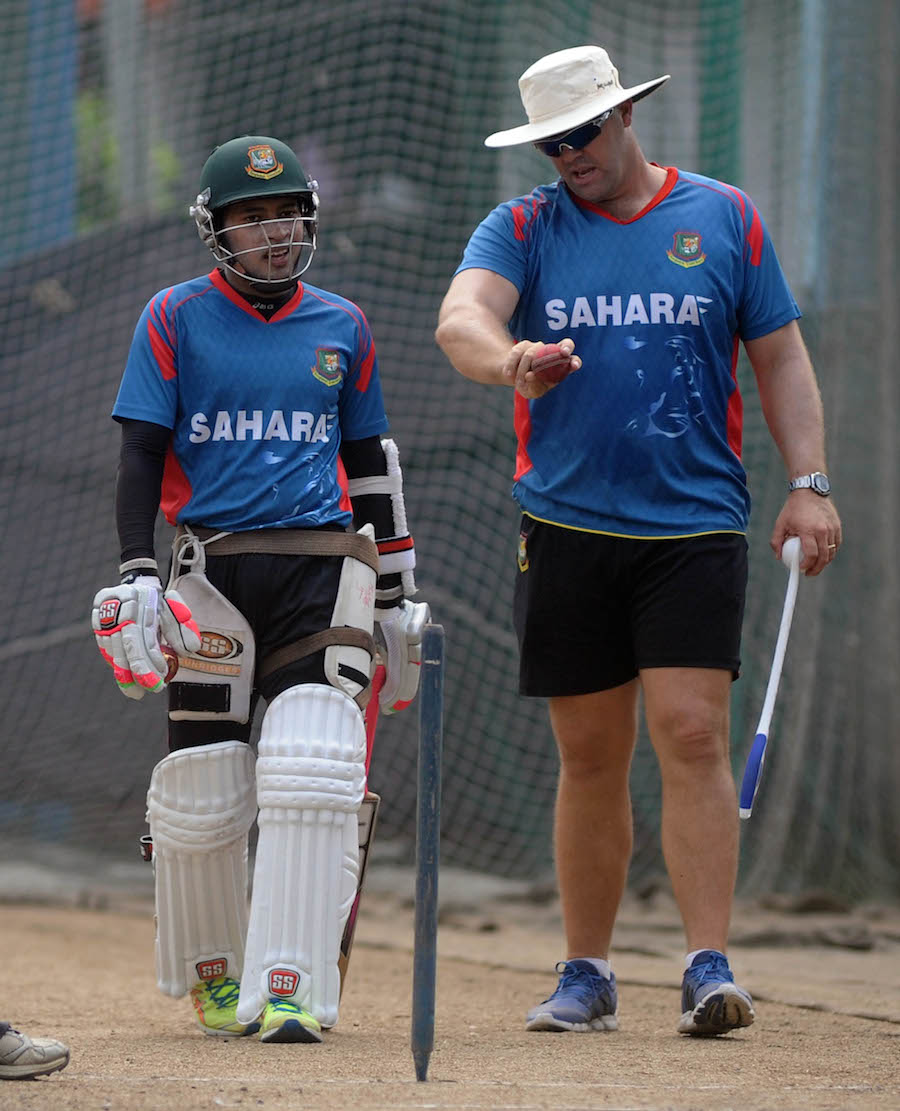 Heath Streak shares his ideas with Mushfiqur Rahim during their practice session at the Sher-e-Bangla National Cticket Stadium in Mirpur on Thursday.