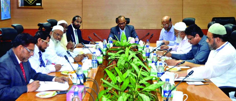 Abdus Samad, Chairman of the Executive Committee of Board of Directors of Al-Arafah Islami Bank Limited, presiding over the 459th meeting at its board room on Thursday. Other board members of the Committee and Managing Director Md Habibur Rahman were pres