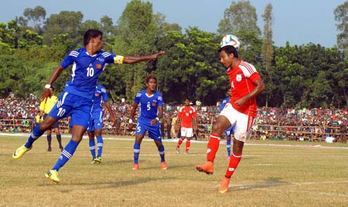 An action from the FIFA international friendly football match between Bangladesh National Football team and Sri Lanka National Football team at the Shamsul Huda Stadium in Jessore on Friday.