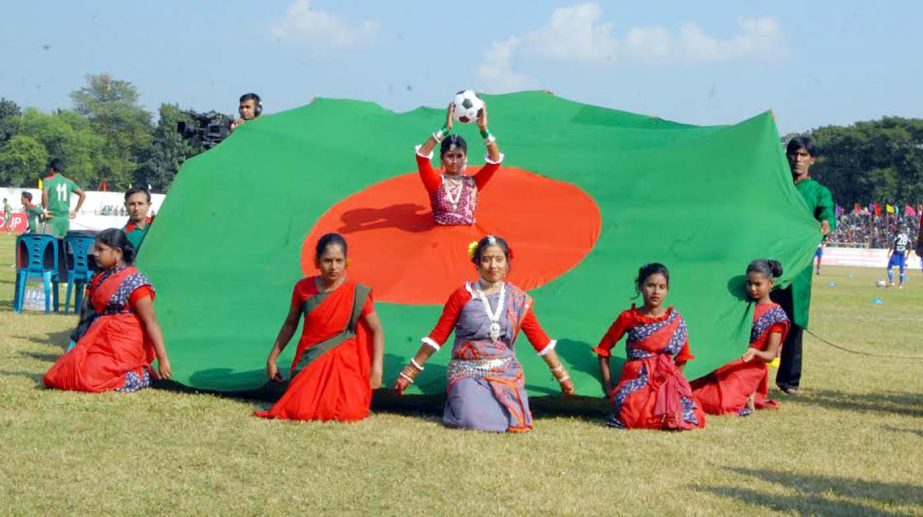 Performers show eye-catching display before the FIFA international friendly football match between Bangladesh National Football team and Sri Lanka National Football team at the Shamsul Huda Stadium in Jessore on Friday.