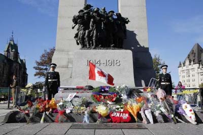 Sentries return to the Tomb of the Unknown Soldier during a ceremony at the National War Memorial in Ottawa