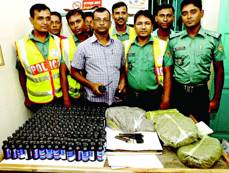 Ganderia Thana police, led by a magistrate raided a house at Dinonath Sen Road and recovered a pistol, phensidyl containing bottles and hemp on Sunday.