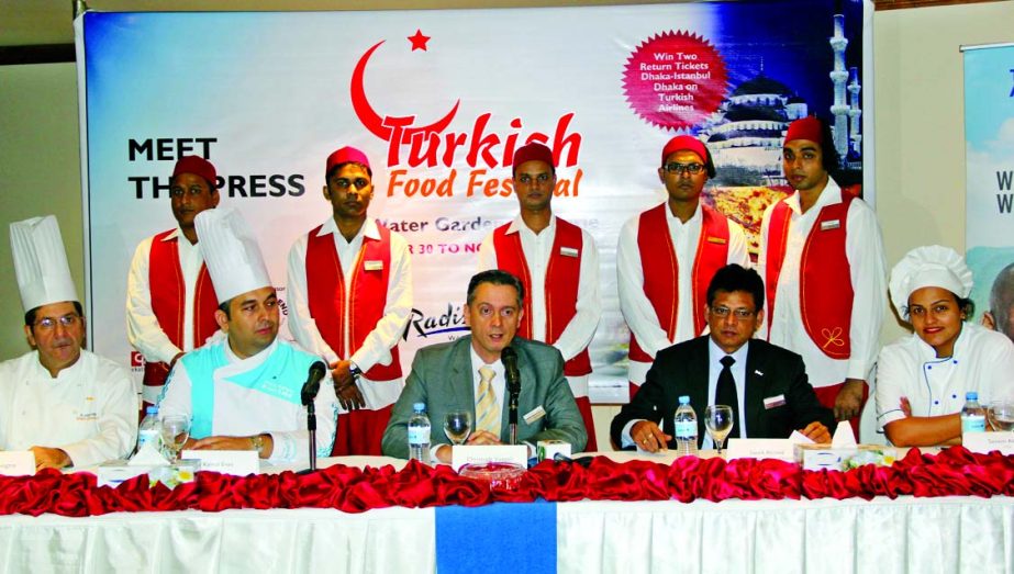 Christoph Voegeli, General Manager of Radisson Blu Water Garden Hotel Dhaka, announcing at a press conference to hold a Turkish Food Festival on 30th October at 6.30pm in the city. Saeed Ahmed, EAM and Director Sales & Marketing, RBWGHD, Kema Enes, and