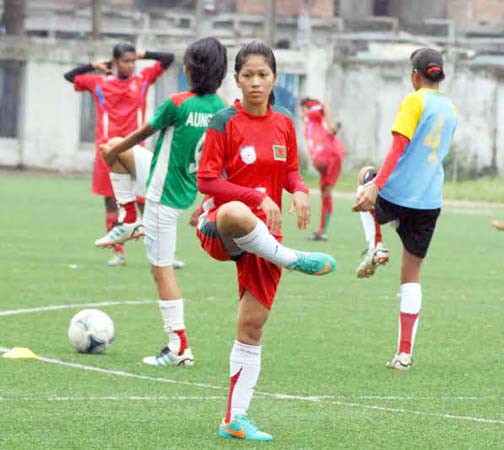 Players of Bangladesh National Women's Football team during their practice session at the BFF Artificial Turf on Tuesday.
