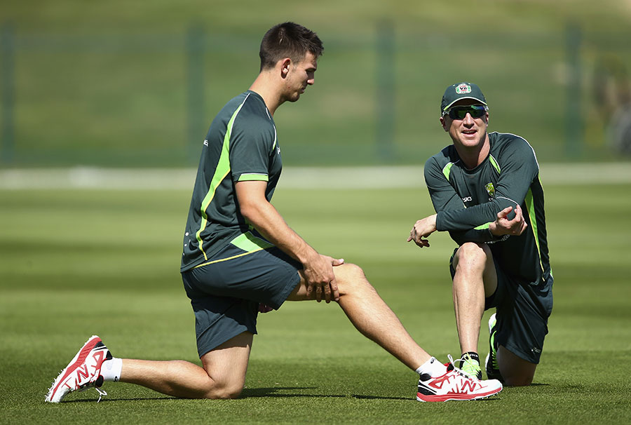 Mitchell Marsh and Brad Haddin stretch during Australia's training session at Abu Dhabi on Wednesday.